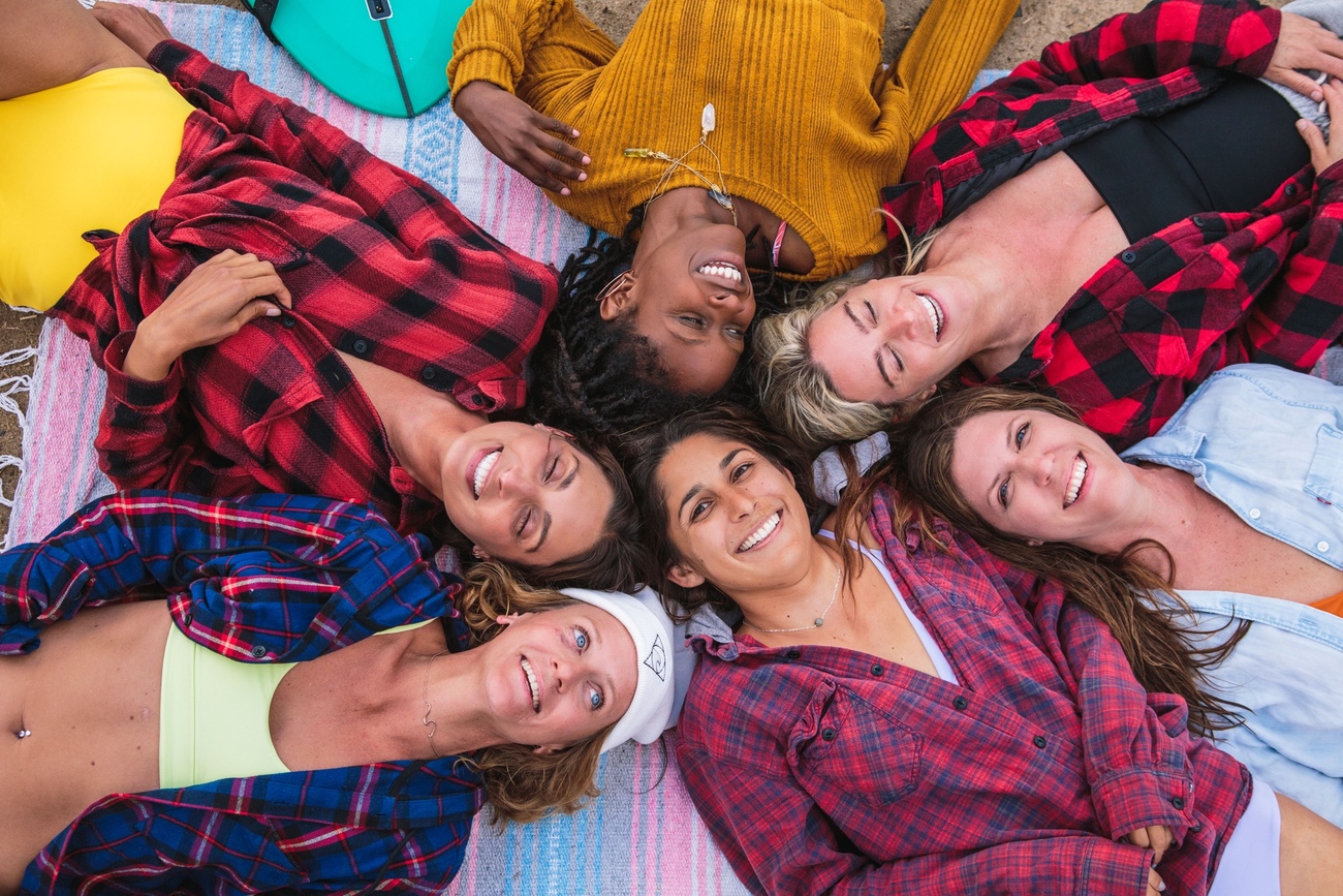 a group of women smiling in a surf retreat El Salvador